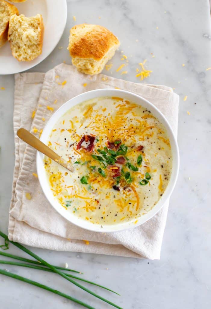 Bowl of Potato Soup with toppings