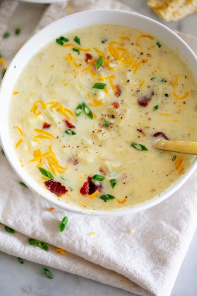 Bowl of Potato Soup with toppings
